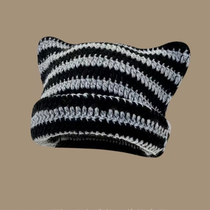 Fairy-like retro knitted hat, cat hat, striped loose crochet hat, warm knitted alternative headwear accessory for winter.