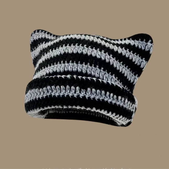Fairy-like retro knitted hat, cat hat, striped loose crochet hat, warm knitted alternative headwear accessory for winter.